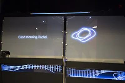 Interior view of the buck showing projected text "good morning, Rachel" message on window